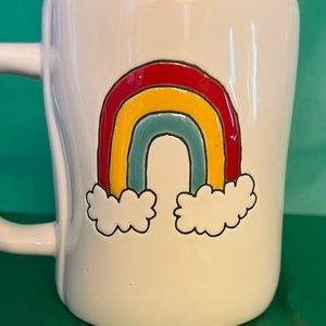 Rae Dunn CHASING RAINBOWS mug with a rainbow on the other side